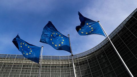 European Union flags outside the EU Commission headquarters in Brussels