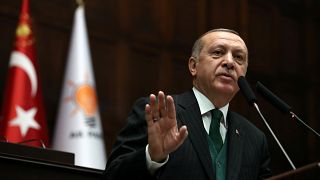 Turkish President Tayyip Erdogan addresses members of parliament