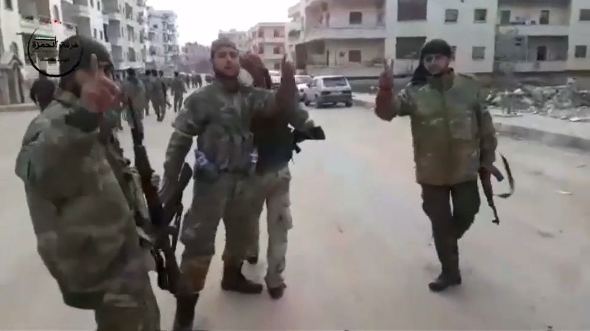 Free Syrian Army forces in footage reportedly shot in Afrin on Sunday