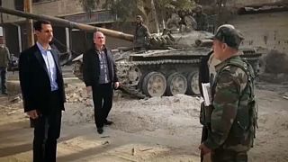 A szétlőtt Kelet-Gútába látogatott Aszad