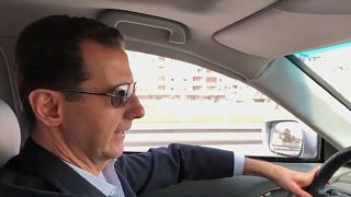 Assad filmed driving himself to the front lines of Syrian civil war