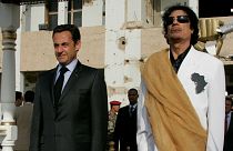 Libya's President Muammar Gaddafi (R) and his counterpart from France Nicol