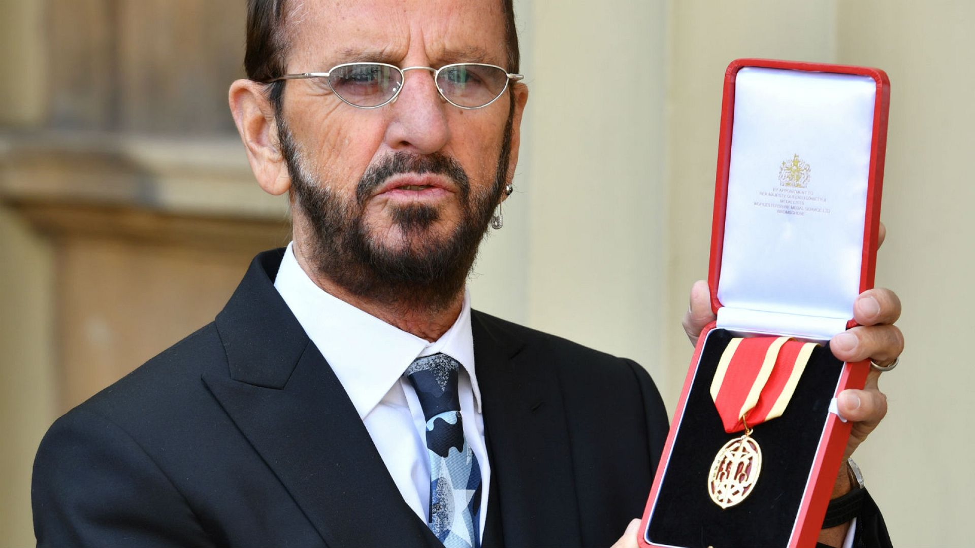 Ex-Beatle Ringo Starr knighted by Prince William in London ceremony ...