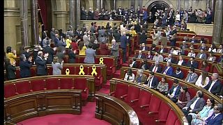 Catalan parliament suspends vote on detained new president