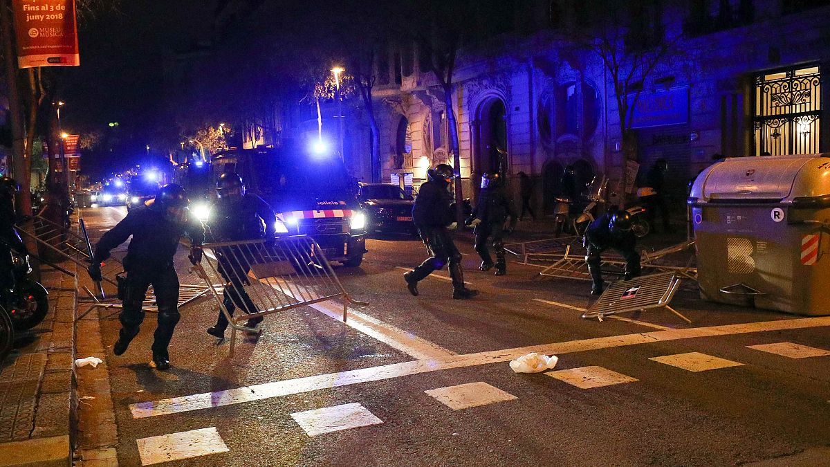 Clashes in Barcelona after Catalan leader Carles Puigdemont is held