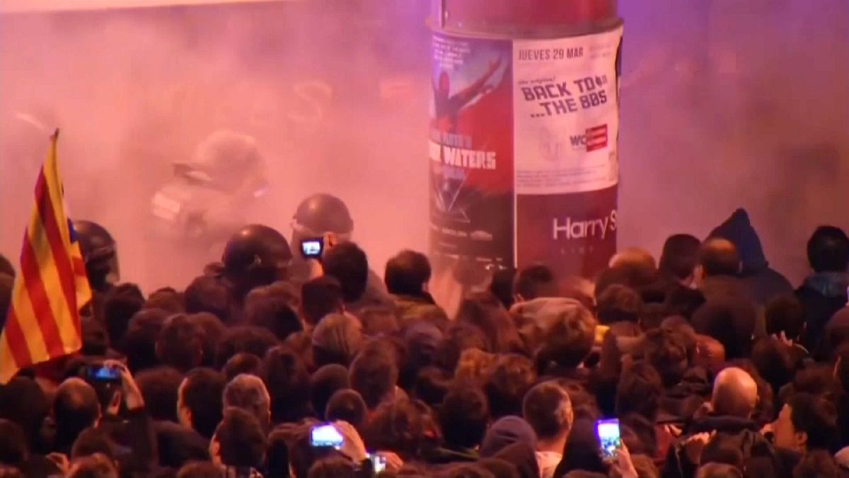 Police and demonstrators clashed in Barcelona after former Catalan leader Carles Puigdemont arrested