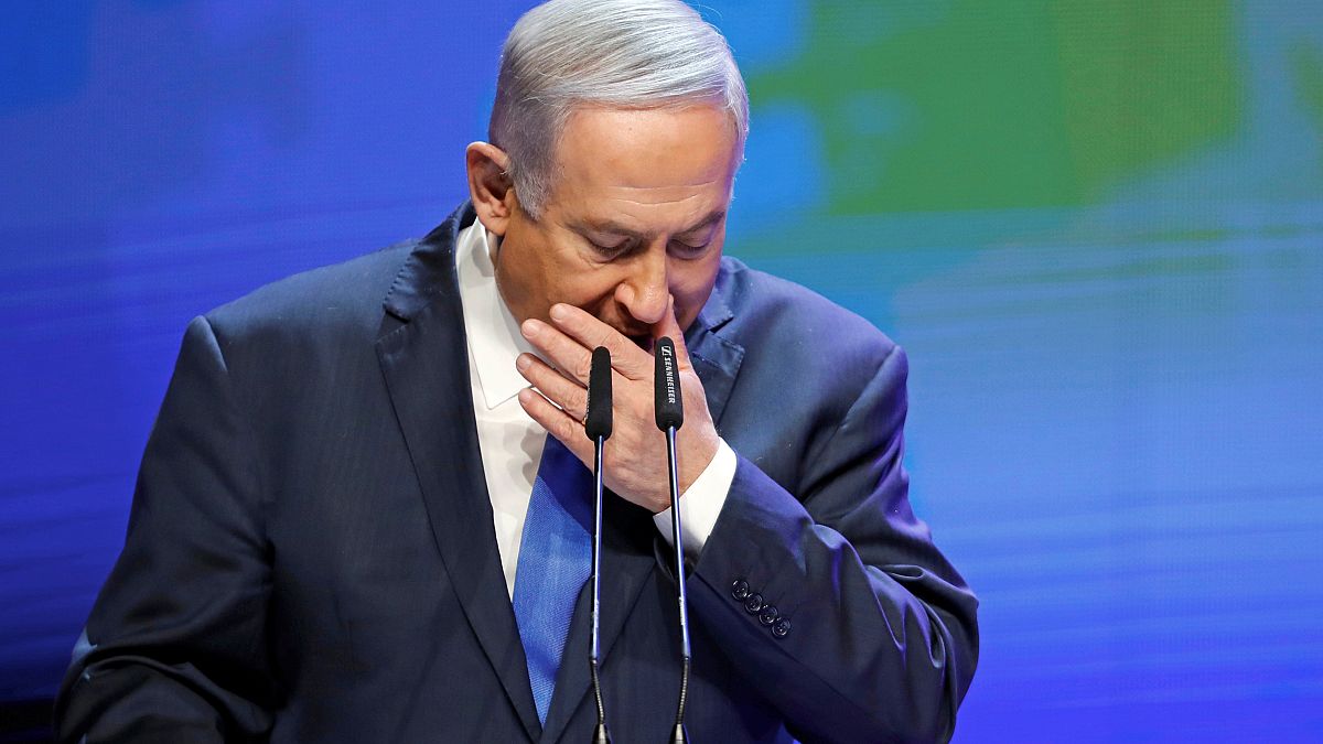 Netanyahu coughs as he addresses a health conference in Tel Aviv