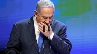 Netanyahu coughs as he addresses a health conference in Tel Aviv