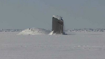 Watch: US submarine surfaces from Arctic Ocean