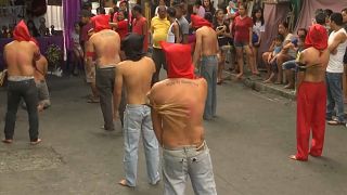 Catholics flagellate themselves for Lent in the northern Philippines