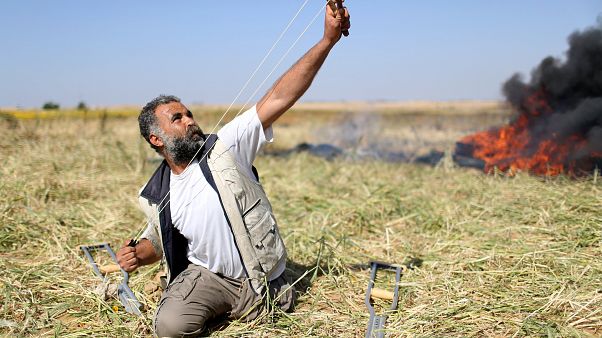 Palestinianios e israelitas trocam acusações sobre mortes de sexta-feira Palestinianios e israelitas trocam acusações sobre mortes de sexta-feira