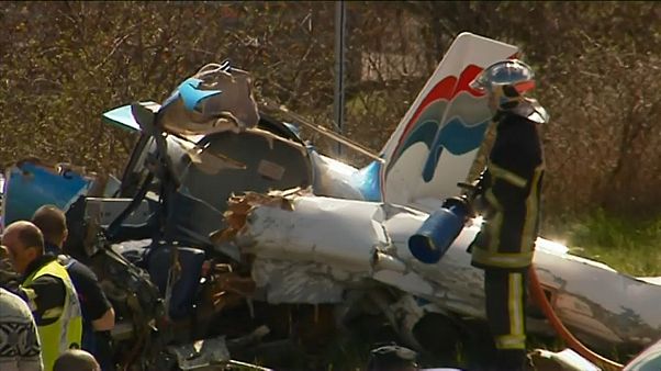 Plane crashes on motorway near Lyon killing two Plane crashes on motorway near Lyon killing two