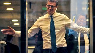 Alex van der Zwaan goes through security at the U.S. District Court after a