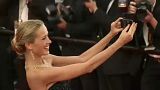 Petra Nemcova taking a selfie on the Cannes red carpet in 2014