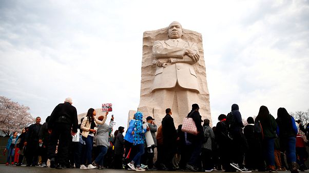 Marchers gather at the MLK Memorial in Washington D.C. Marchers gather at the MLK Memorial in Washington D.C.