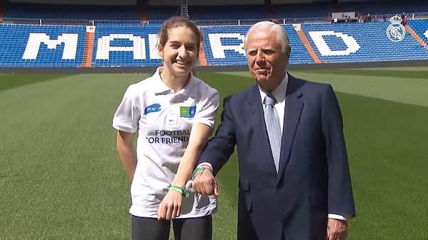 Real Madrid's Enrique Sanchez and F4F ambassador Real Madrid's Enrique Sanchez and F4F ambassador