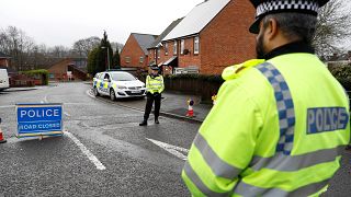 Police officers near Sergei Skripal's house in Salisbury, England.