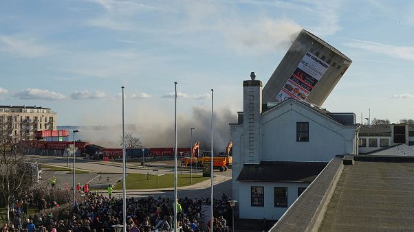Watch: Denmark silo demolition goes badly wrong crushing nearby building Watch: Denmark silo demolition goes badly wrong crushing nearby building