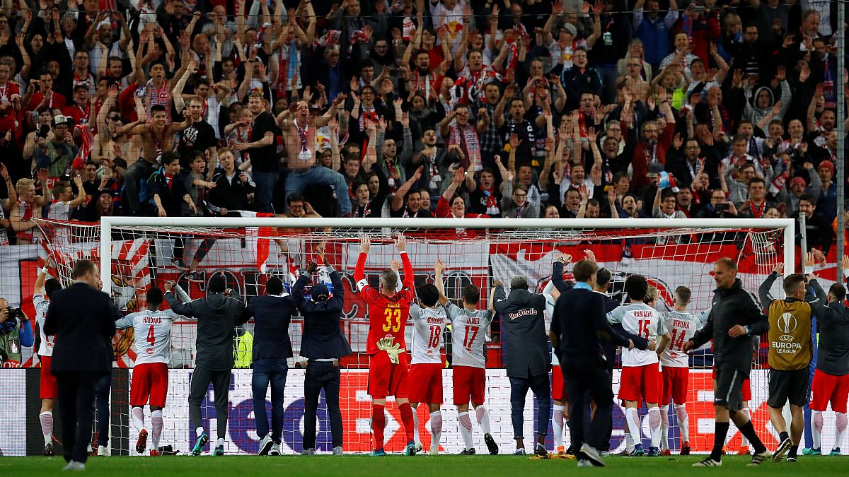RB Salzburg players salute their fans after the match v Lazio