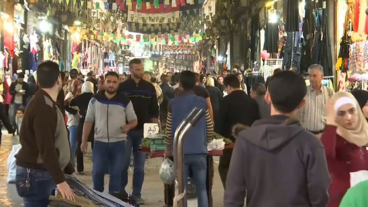 La vida sigue en Damasco pese a las amenazas de ataque inminente 