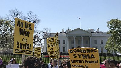 Watch: Protests against Syria air strikes take place outside White House