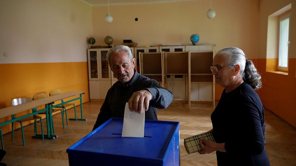 People in Montenegro cast their votes People in Montenegro cast their votes