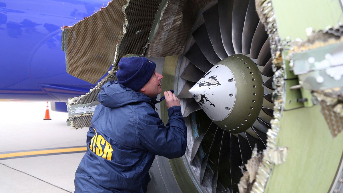 NTSB investigator is on scene examining damage to the engine of the Southwe