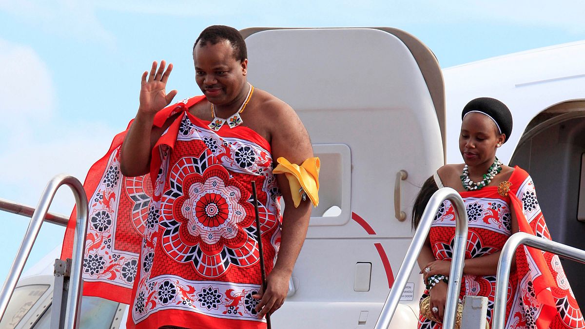 King Mswati III with one of his wives