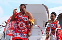 King Mswati III with one of his wives