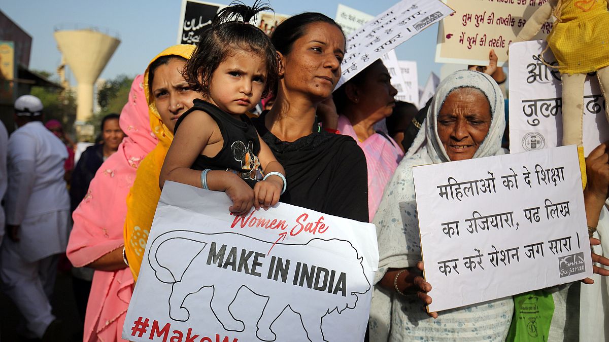 Women protest against recent cases of child rapes in India