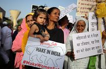 Women protest against recent cases of child rapes in India