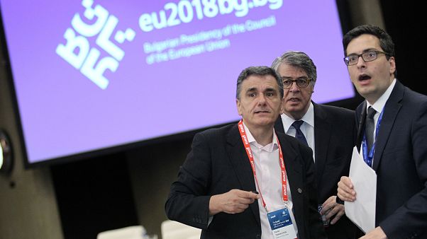 Ministro das Finanças da Grécia e a sua equipa Ministro das Finanças da Grécia e a sua equipa