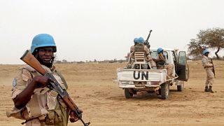 FILE PHOTO: UN peacekeepers stand guard in Kouroume, Mali, in May, 2015.