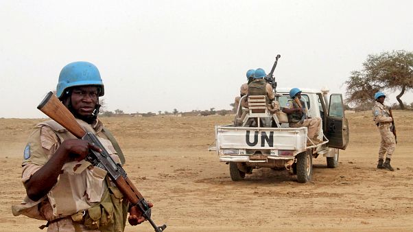 FILE PHOTO: UN peacekeepers stand guard in Kouroume, Mali, in May, 2015. FILE PHOTO: UN peacekeepers stand guard in Kouroume, Mali, in May, 2015.