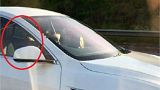 Watch: Tesla driver ‘puts on autopilot and moves to passenger seat’