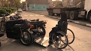 Disabled woman creates custom-made motorbike to travel in Iran