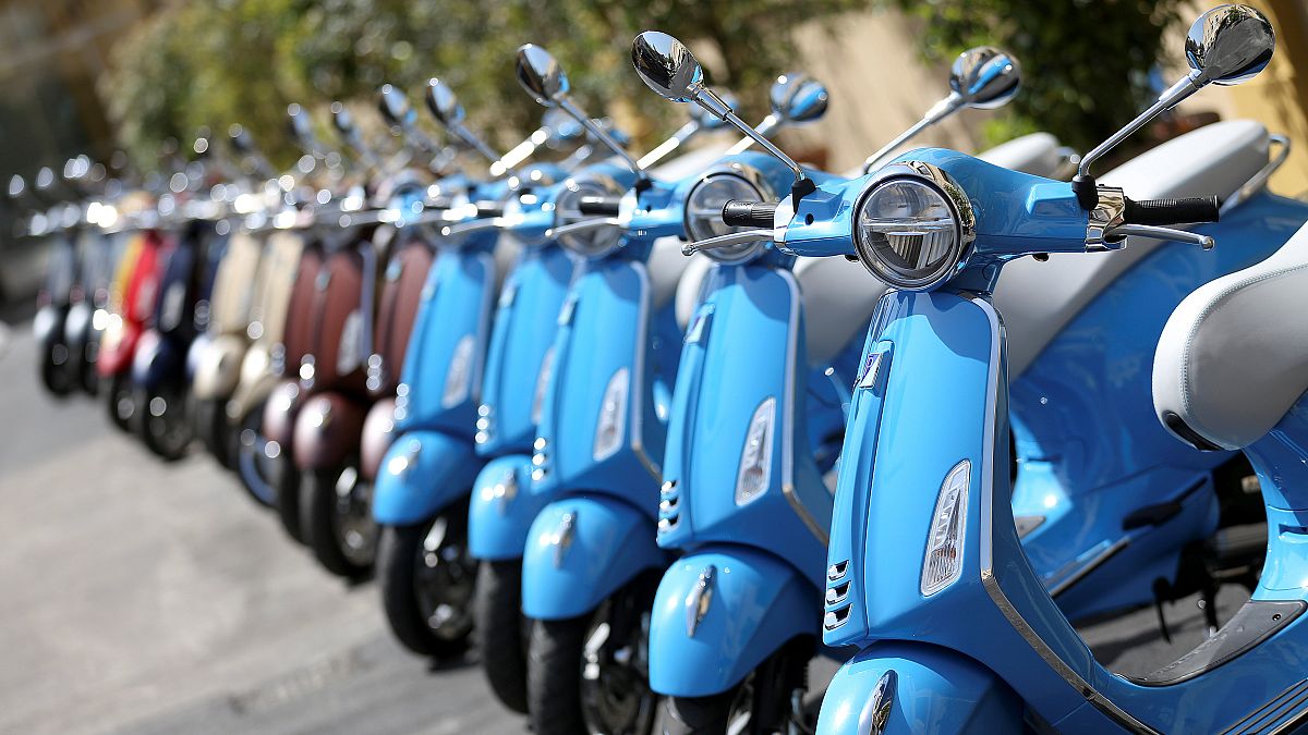 Vespa Primavera scooters parked