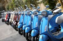Vespa Primavera scooters parked