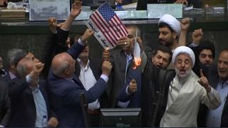 ‘Death to America’: Iran MPs burn American flag in parliament