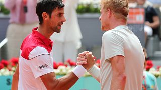 Edmumd shakes hands with Djokovic after his second round victory