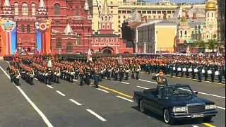 Putin reviews Russia's 'invincible weapons' in Red Square military parade