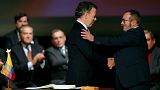 Colombian President Juan Manuel Santos and FARC leader Rodrigo Londono