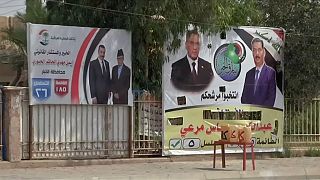صور المرشحين في شوارع العراق