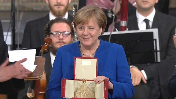 The German Chancellor, Angela Merkel received the 'Lamp of Peace' The German Chancellor, Angela Merkel received the 'Lamp of Peace'