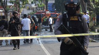 A series of church bombings killed at least 6 people in Indonesia on May 13