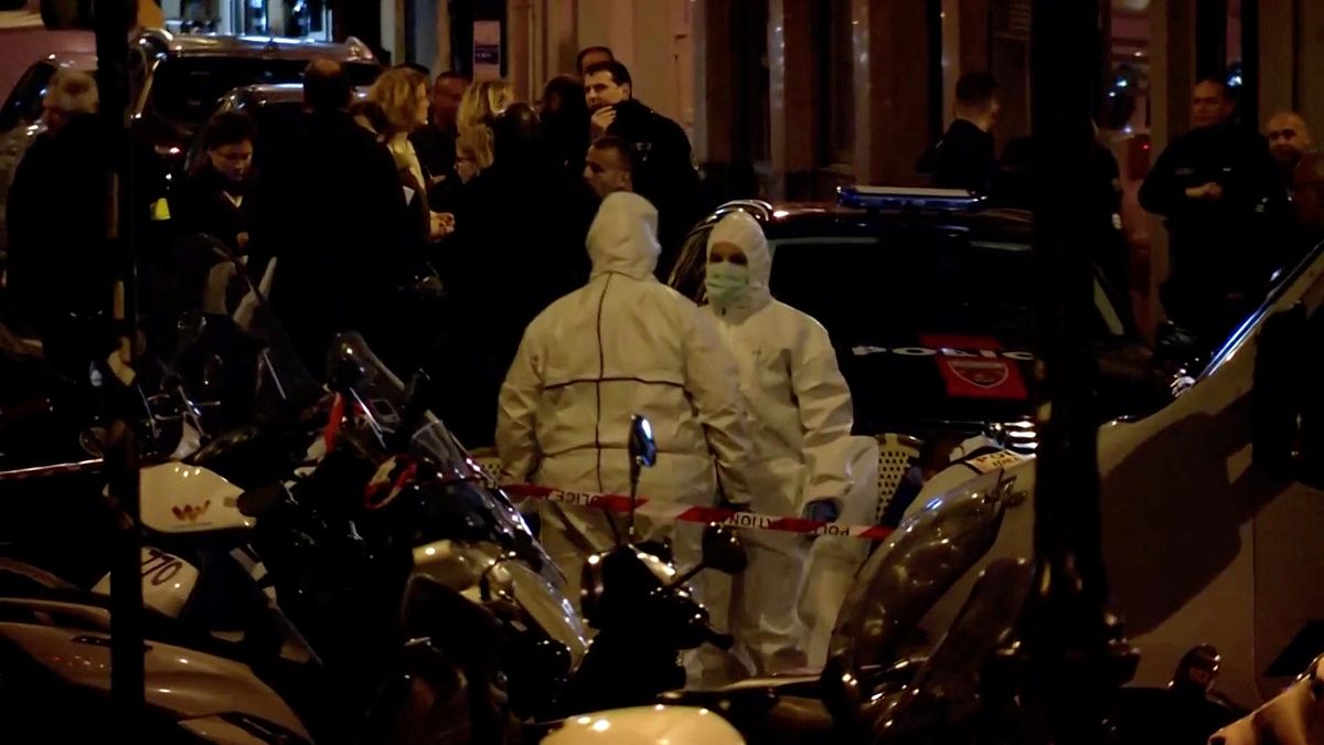 Forensic personnel at the scene of a knife attack in Paris, France May 12 