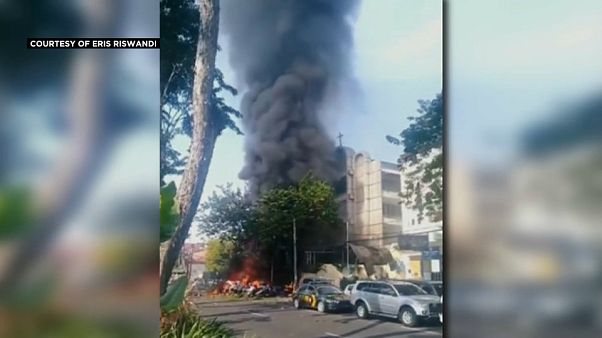 Suicide bombers kills at least a dozen in attacks on churches in Indonesia Suicide bombers kills at least a dozen in attacks on churches in Indonesia