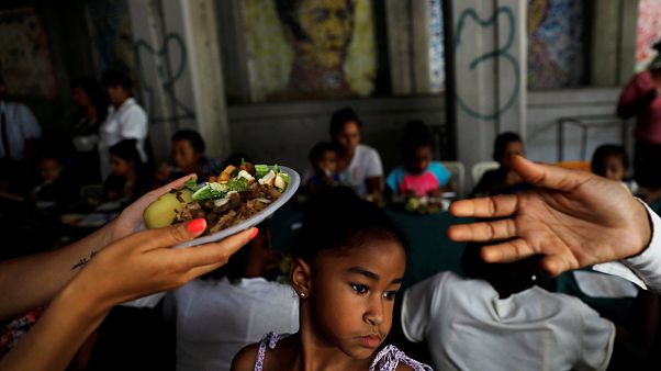 Reparto de alimentos durante la campaña en Caracas Reparto de alimentos durante la campaña en Caracas