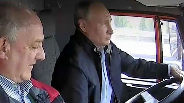 Putin drives truck across new Russia-Crimea bridge Putin drives truck across new Russia-Crimea bridge