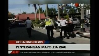 Militants armed with swords attack Indonesian police station